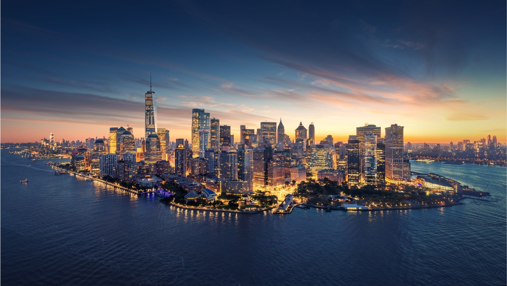 New York City panorama skyline at sunrise. Manhattan office buildings or skysrcapers at the morning. New York City panoramatic shot.