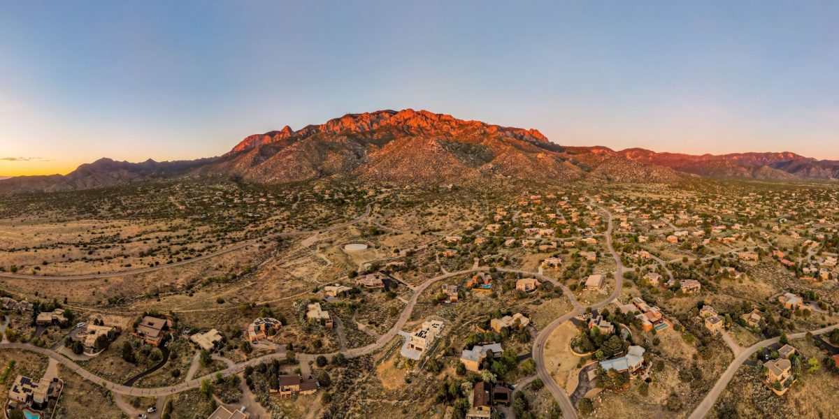 Sandia mountains in Albuquerque, New Mexico at sunset, glowing pink