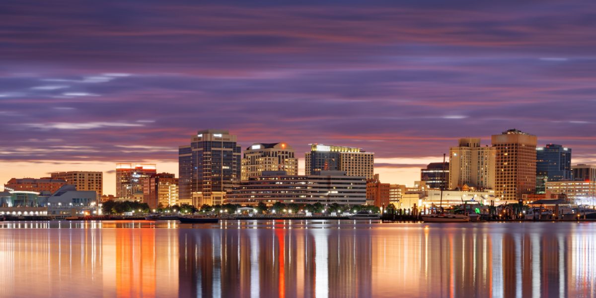 Norfolk, Virginia, USA downtown skyline on the Elizabeth River in the morning.