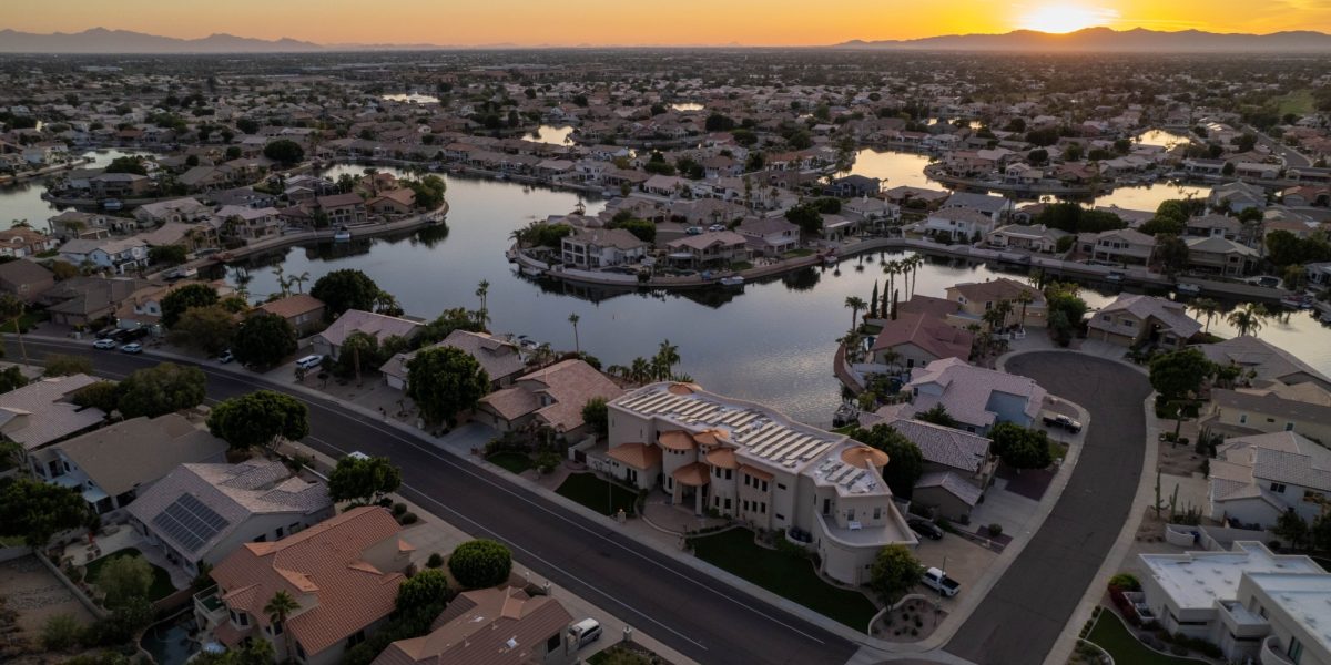 An aerial view of suburban houses at sunset. Arrowhead Lakes, Glendale Arizona