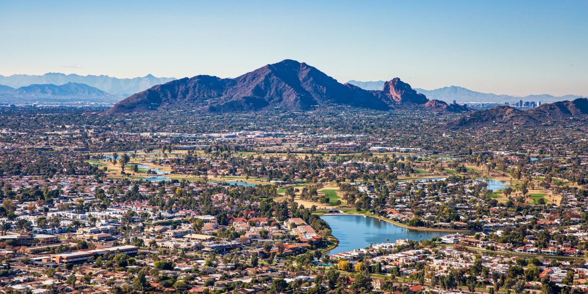 Aerial view from above Scottsdale looking SW towards Camelback Mountain and downtown Phoenix, Arizona