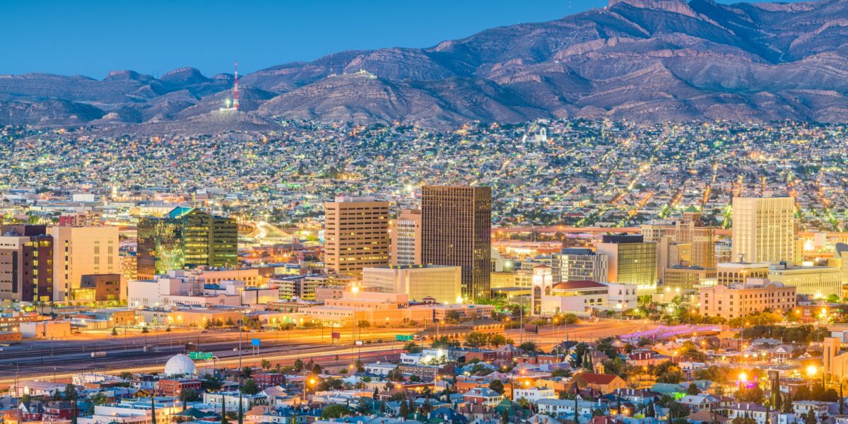 El Paso, Texas, USA downtown city skyline at dusk with Juarez, Mexico in the distance.