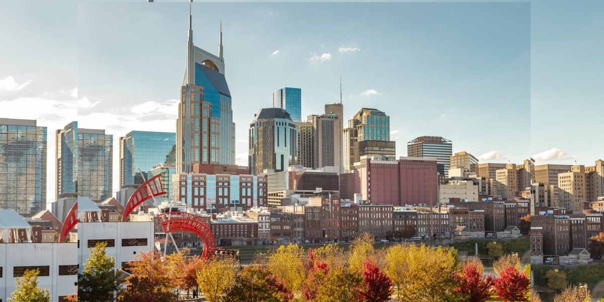 Downtown Nashville city skyline building view along the Cumberland River. Photo taken in Nashville Tennessee during a cloudy autumn day