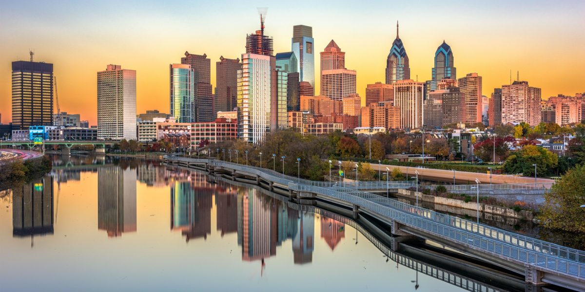 Philadelphia, Pennsylvania, USA downtown skyline at dusk on the Schuylkill River.