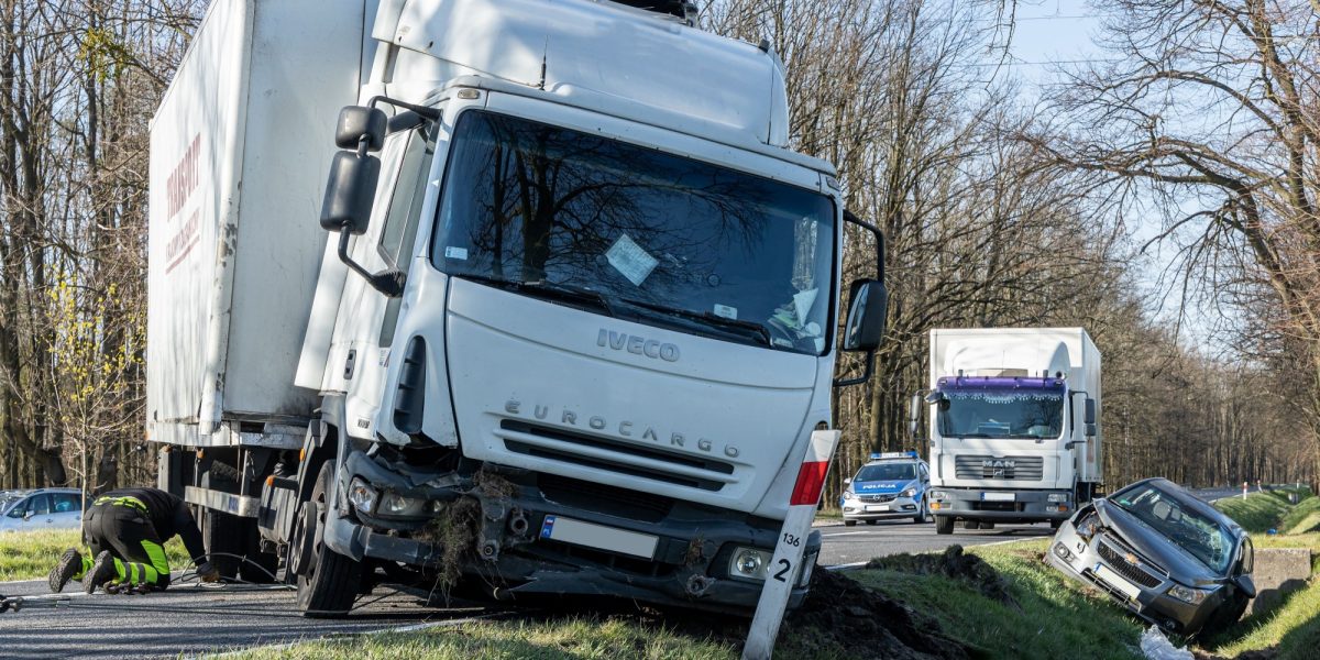 15.04.20 Poland. Truck accident. At the rear, a passenger car destroyed in an accident in a ditch