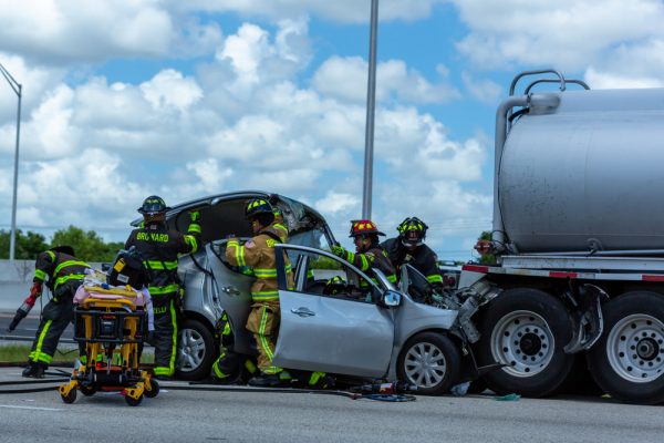 $3 Million Settlement Reached for Florida Truck Crash Victim | Firemen use the jaws of life to help driver from a horrible accident.